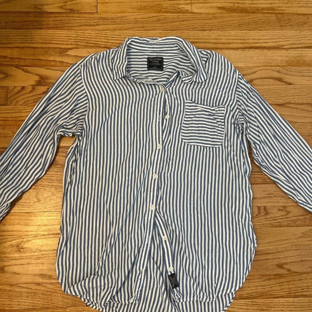 Blue and white stripped button shirt